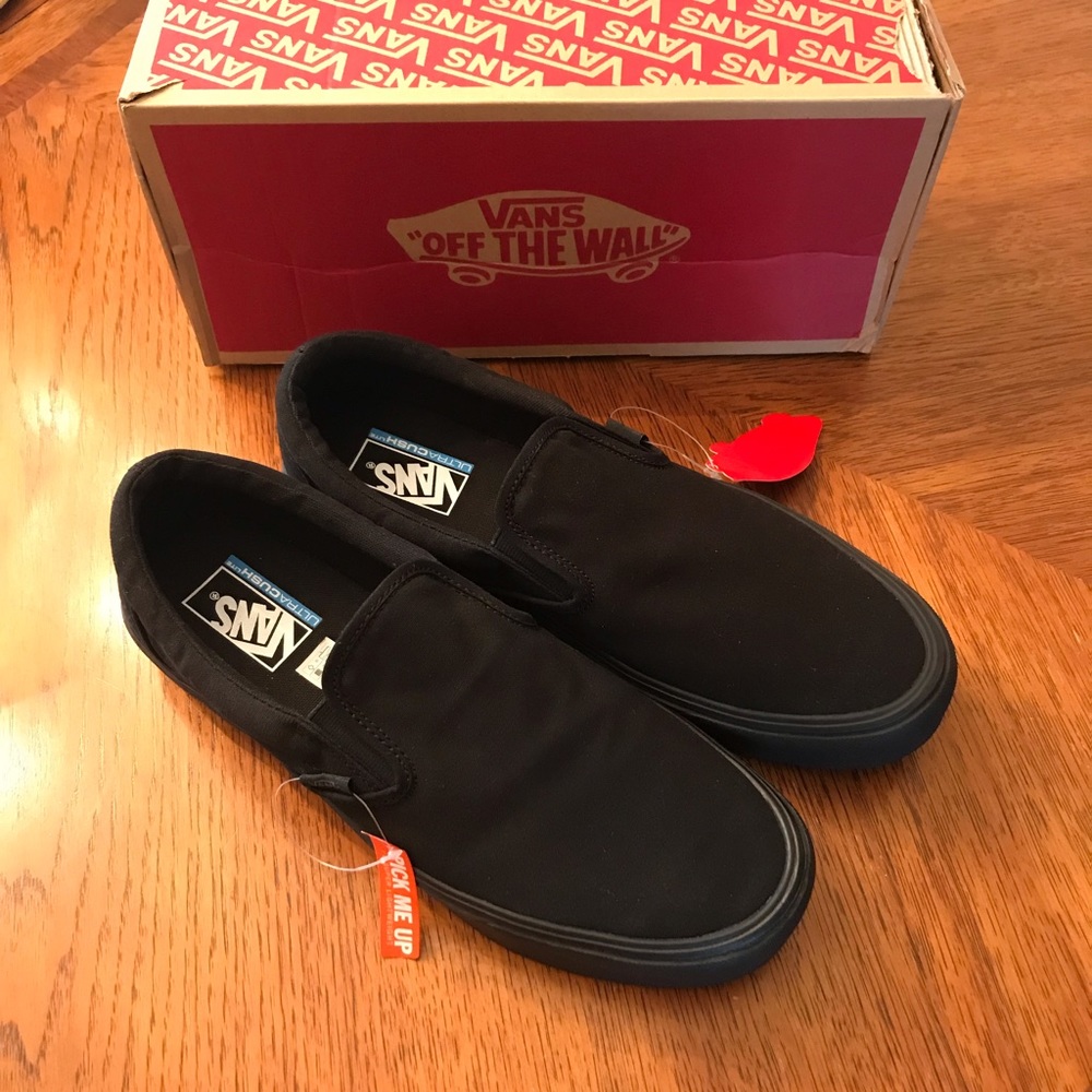 All Black Classic Vans Slip ons